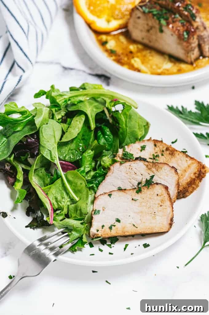 Orange Mustard Pork Tenderloin - This easy glazed tenderloin recipe is sweet and savory with orange juice and stone ground mustard. You'll never have a dry piece of pork with this homemade marinade.