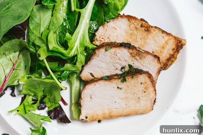 Orange Mustard Pork Tenderloin - This easy glazed tenderloin recipe is sweet and savory with orange juice and stone ground mustard. You'll never have a dry piece of pork with this homemade marinade.