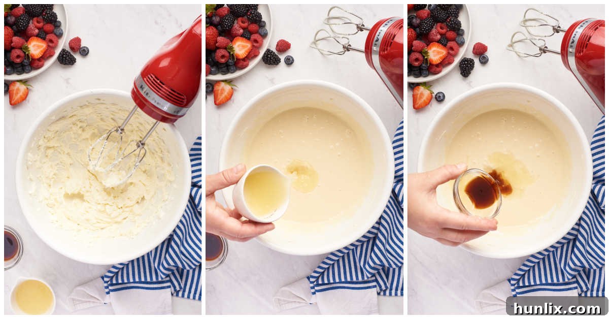 Cream cheese filling being mixed in a bowl with an electric mixer.