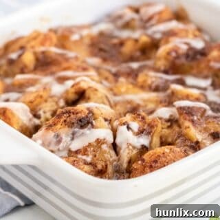 The Apple Cinnamon Bun Breakfast Casserole in a white baking dish.