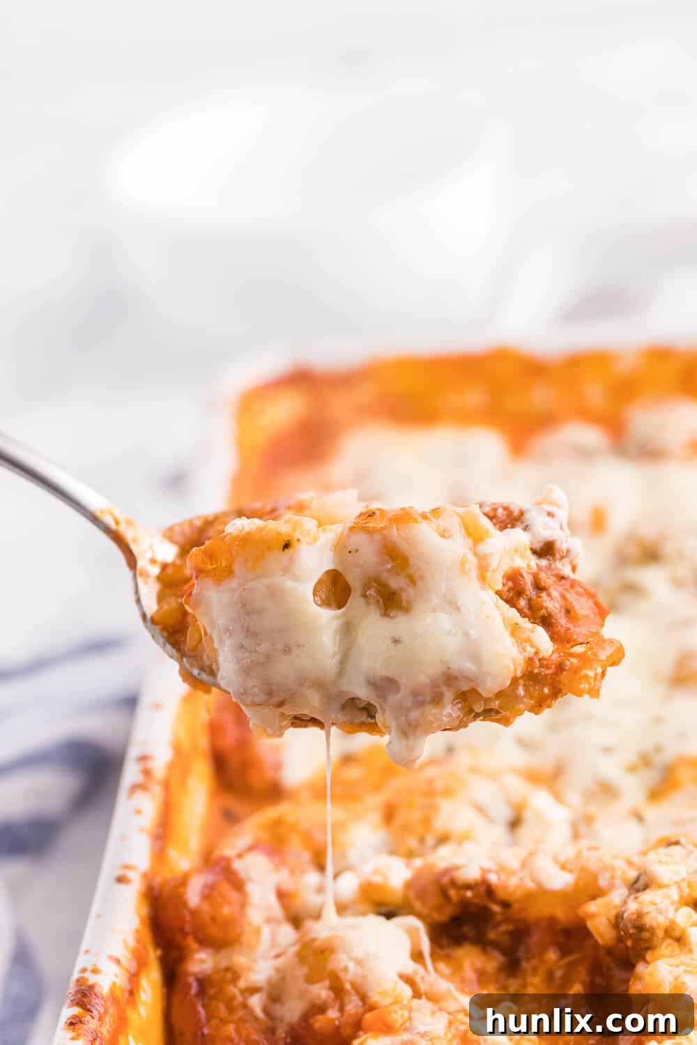 Lasagna Tater Tot Casserole - A hearty, cheesy, and easy-to-make casserole, ideal for a family dinner.