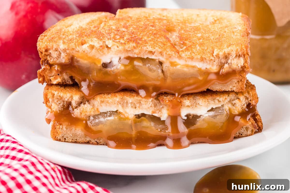 Sweet & Savory Caramel Apple Melt 9 A beautifully crafted caramel apple grilled cheese sandwich on a plate, ready to be enjoyed.
