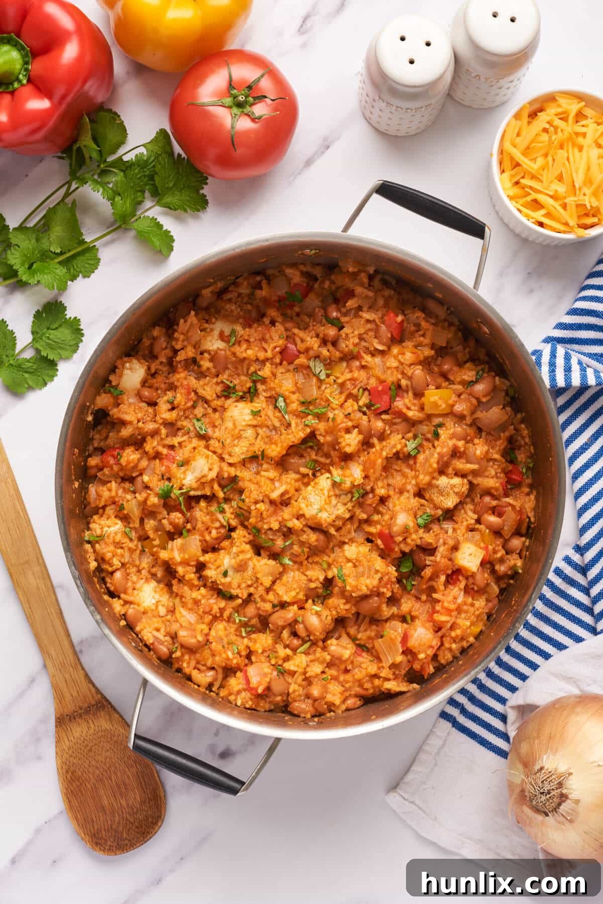 Skillet Chicken Burrito Fiesta 2 Hearty chicken burrito bowl simmering in a large pot, ready to be served.