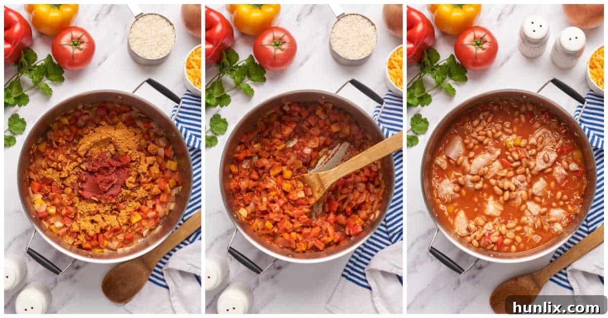 Skillet Chicken Burrito Fiesta 5 The second stage of making the one-pot chicken burrito bowl, with chicken, rice, and beans added and simmering.