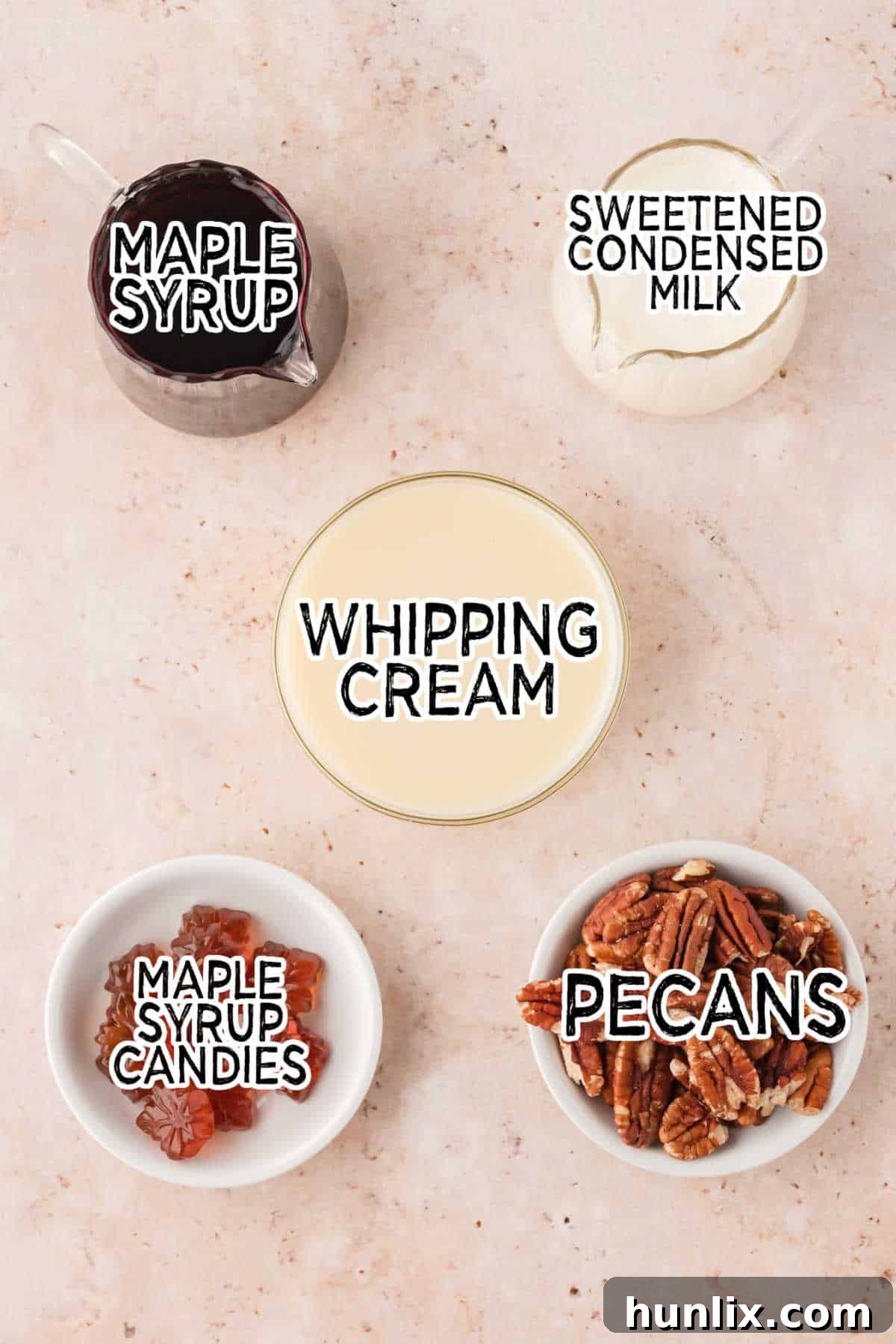 Maple Pecan Ice Cream Delight 3 A collection of fresh ingredients laid out for making maple pecan ice cream, including whipping cream, condensed milk, maple syrup, and pecans.