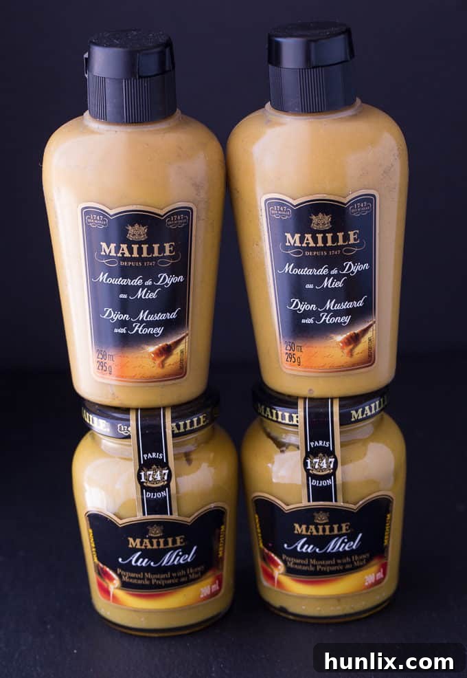 Honey Dijon Baked Cauliflower - Honey Dijon Mustard packs a wonderful flavour punch in this creamy, smooth sauce. Even picky kids love this recipe! 