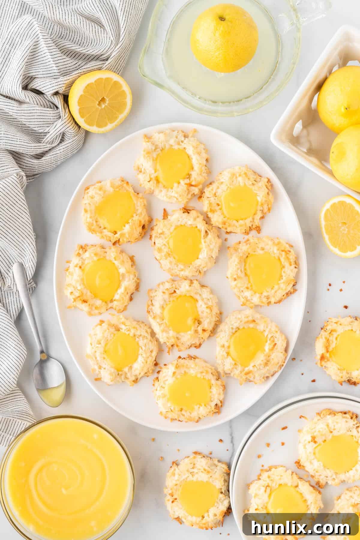 Delightful lemon curd coconut macaroons arranged elegantly on a platter, ready to be enjoyed.