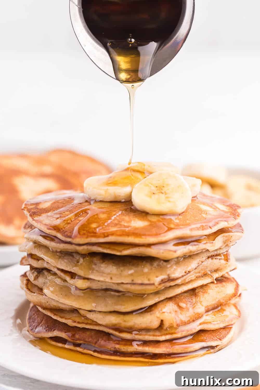 Freshly cooked cinnamon banana pancakes on a griddle