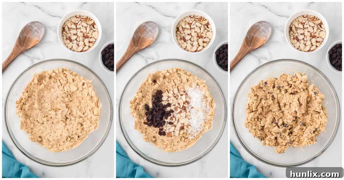 Hearty Trail Mix Oatmeal Cookies 7 The final step of mixing in slivered almonds, raisins, and shredded coconut into the cookie dough, creating a vibrant trail mix effect.