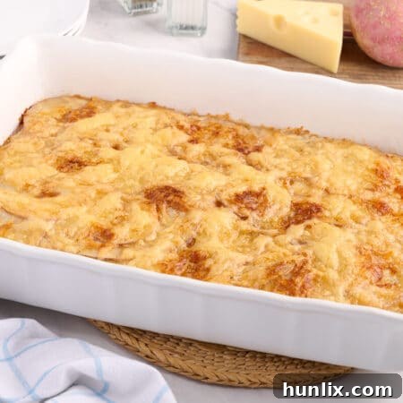 Swiss potatoes in a baking pan.