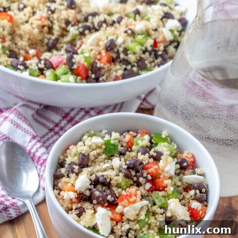 Healthy black bean and feta quinoa salad, easy to prepare and served cold, perfect as a side for BBQ or a light meal.