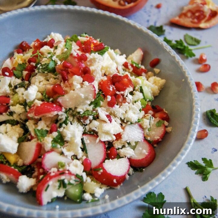 Naturally gluten-free cauliflower cous cous salad, incredibly easy to make and bursting with vibrant, fresh flavor.