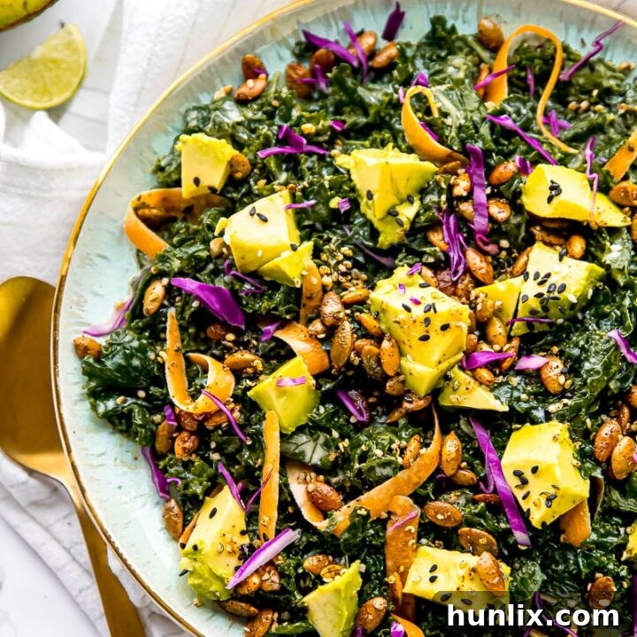 The Best Kale Salad with a creamy sesame tahini dressing, combining freshness and rich flavor for an unforgettable meal.