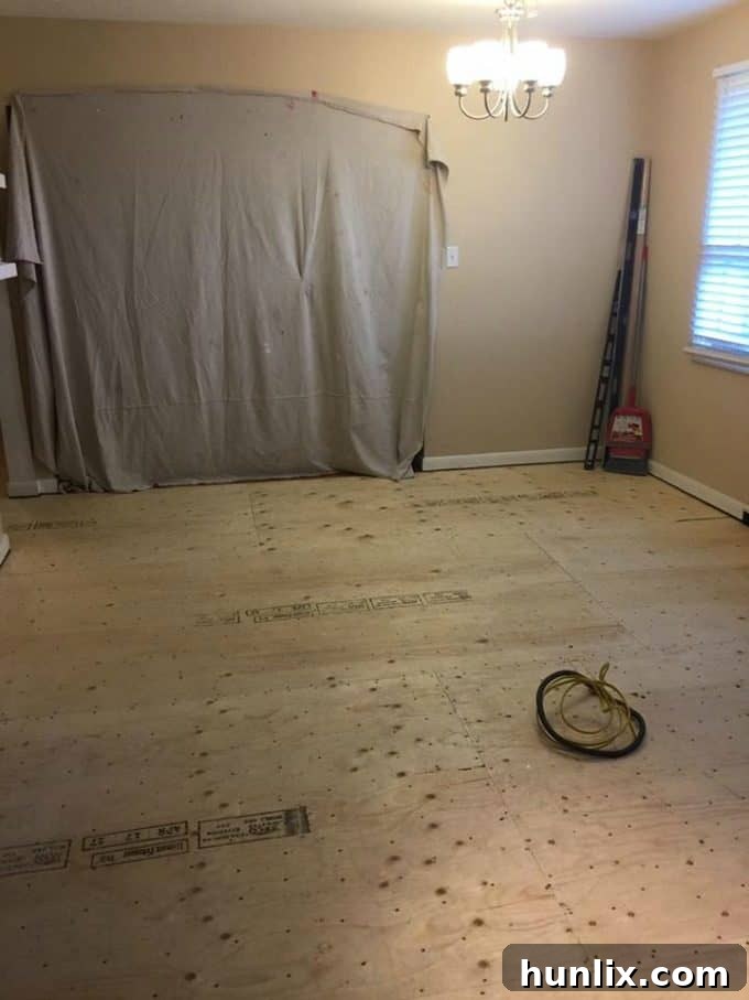 Kitchen renovation progress: New plywood subfloor installed, ready for tiling