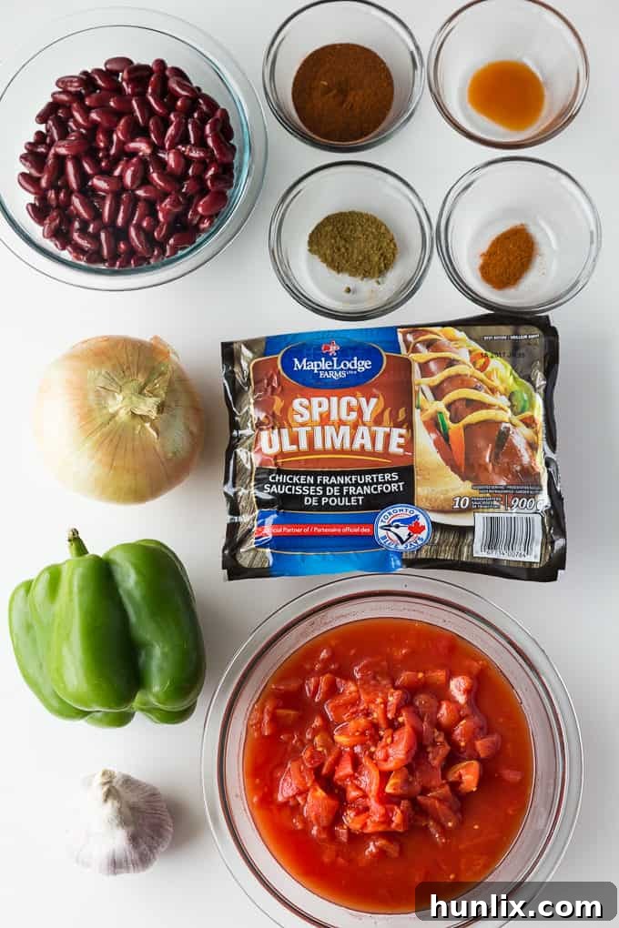 Spicy Chili Nachos - The Ultimate Party Appetizer. This easy recipe is packed full of fiery flavor and perfect for summer entertaining.