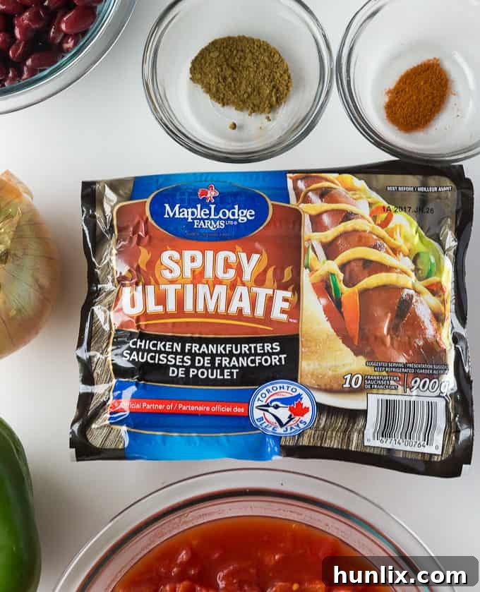 Maple Lodge Farms Spicy Ultimate Chicken Frankfurters being prepared for Spicy Chili Nachos. A unique and flavorful chili ingredient.