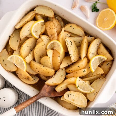 A pan of the recipe with a wooden spoon.