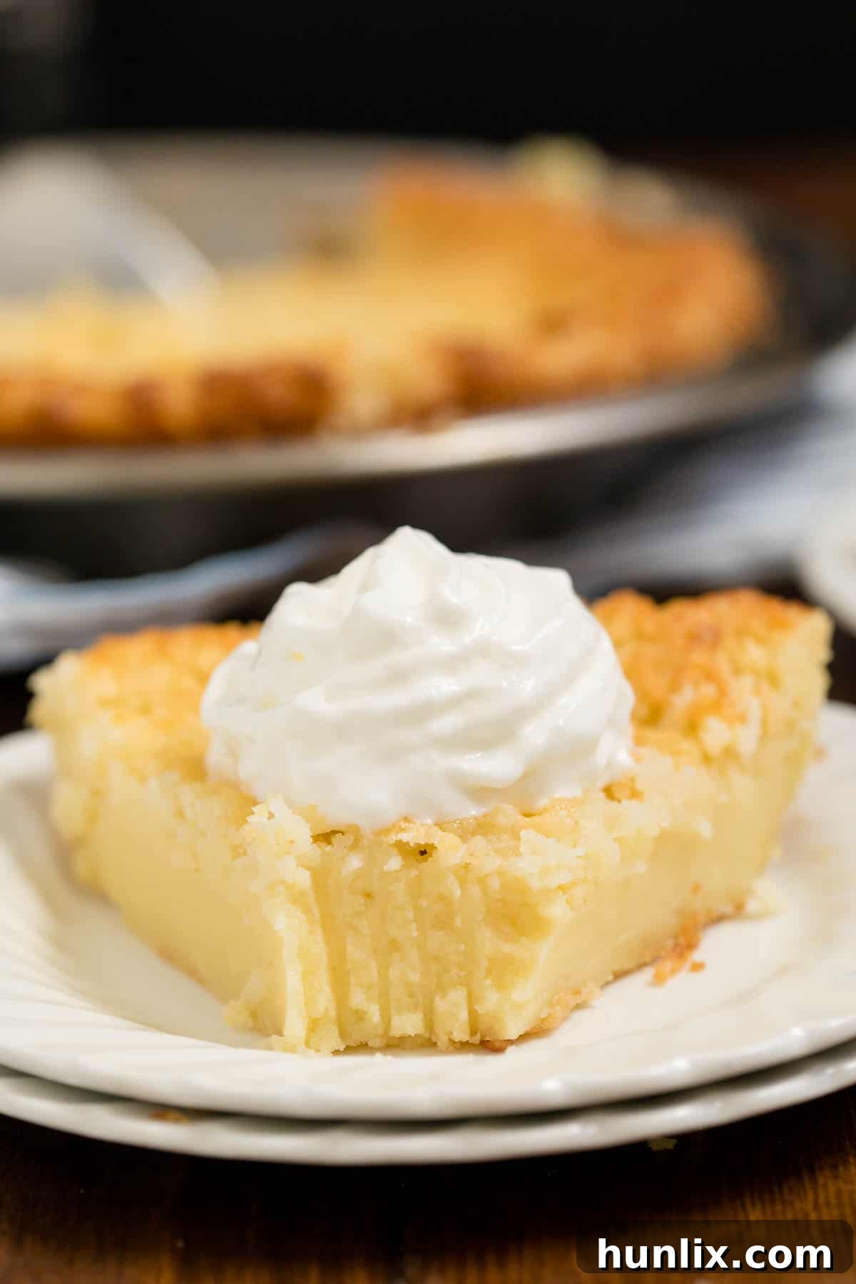 Impossible Pie - The easiest pie you will ever bake! It magically forms its own crust plus two delicious layers while baking.