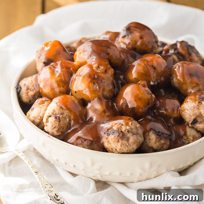 Glazed Sweet and Tangy Meatballs 2 Sweet and Sour Meatballs - Your favorite Chinese dish becomes a crowd-pleasing appetizer. These easy meatballs are smothered in a sweet and tangy sauce and ready in 30 minutes.