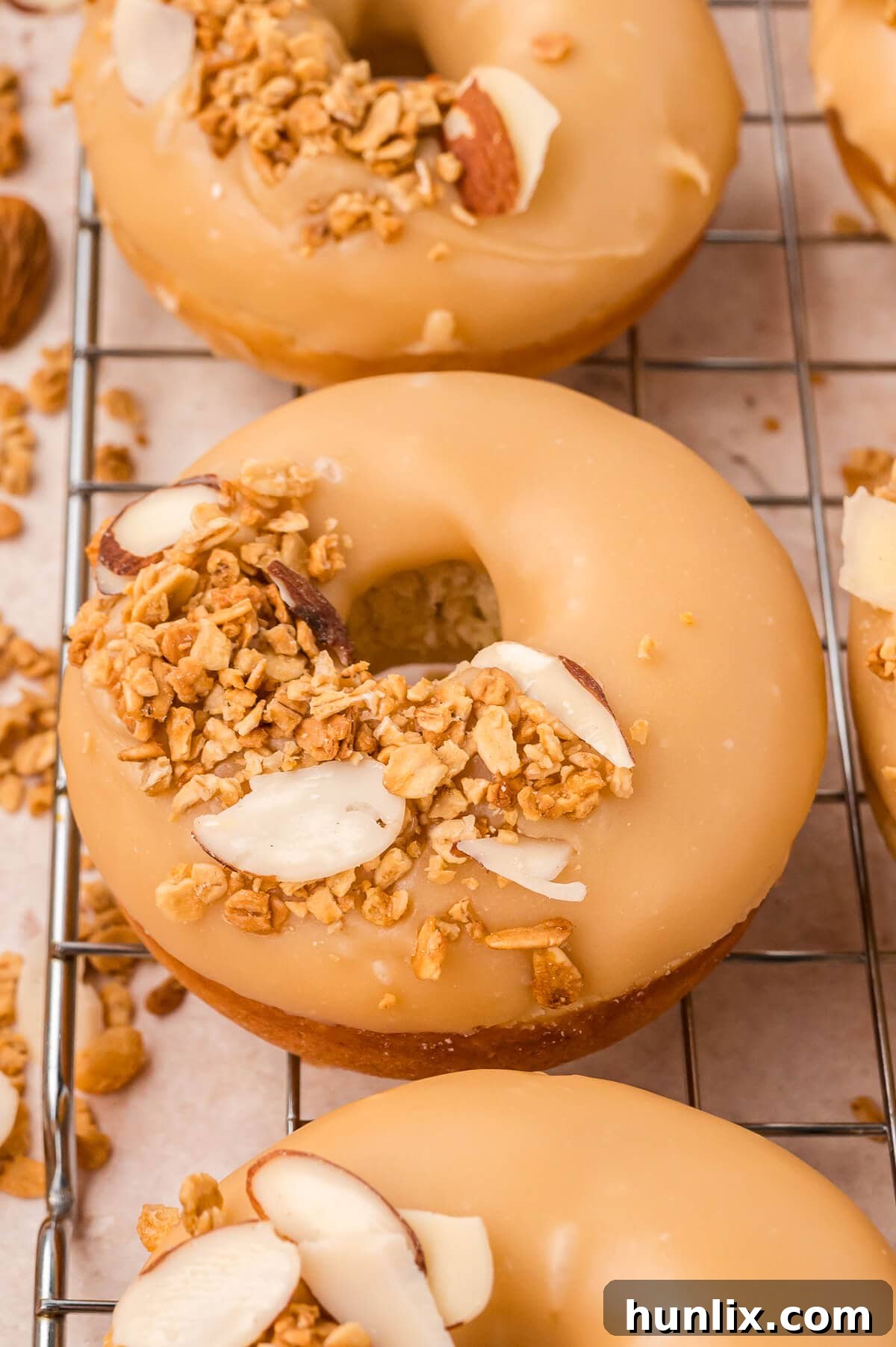 Baked brown sugar glazed donuts on a wire rack.