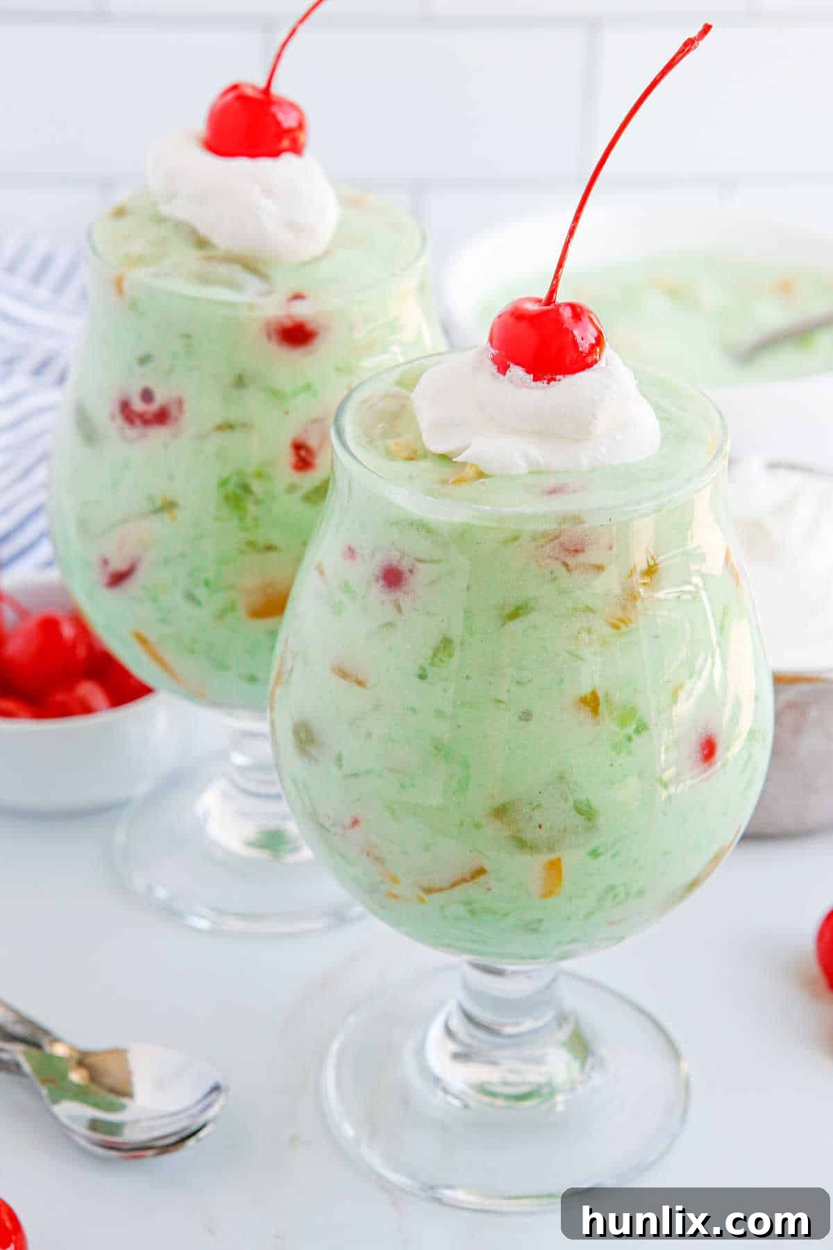 Vibrant Fruit Delight 2 Fruit Cocktail Dessert in parfait dishes.