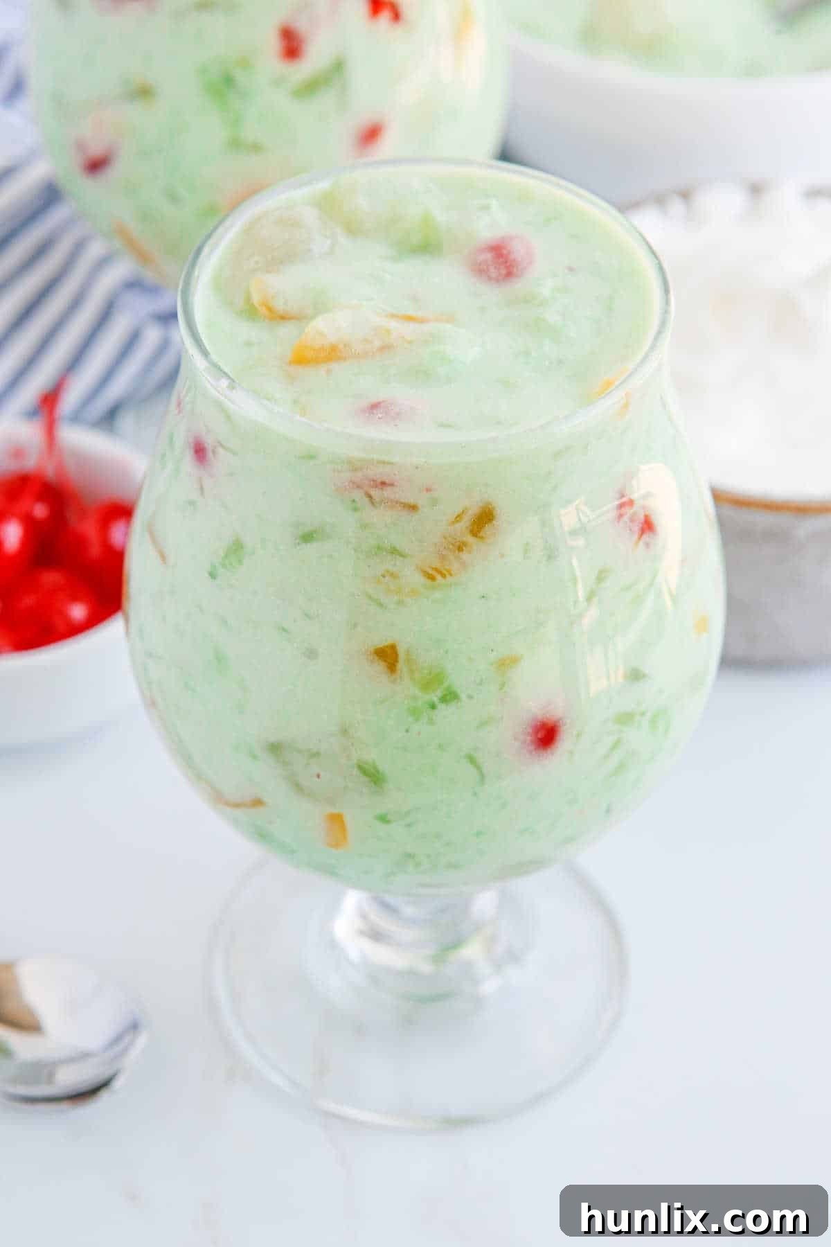 Vibrant Fruit Delight 8 Fruit cocktail dessert in a parfait dish.