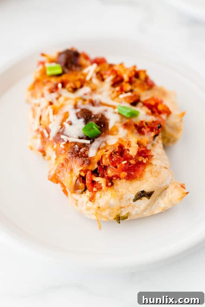 Salsa Chicken - The easiest Mexican chicken recipe! Smother your favorite cut of chicken with tomatoes, peppers and spices for a quick and easy family-friendly dinner.