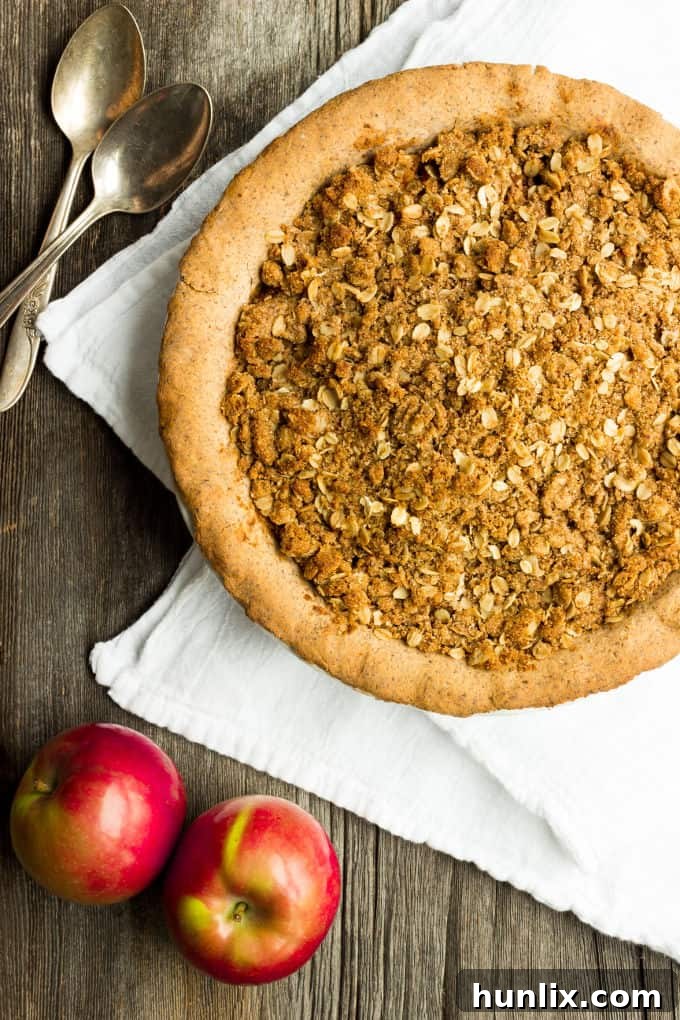 Deep Dish Apple Pie with Crumb Topping - The perfect fall dessert. This easy to make and 100% healthy dessert is made of 100% real food ingredients. It is gluten-free, vegan, dairy-free, flourless, egg-free and full of flavor!