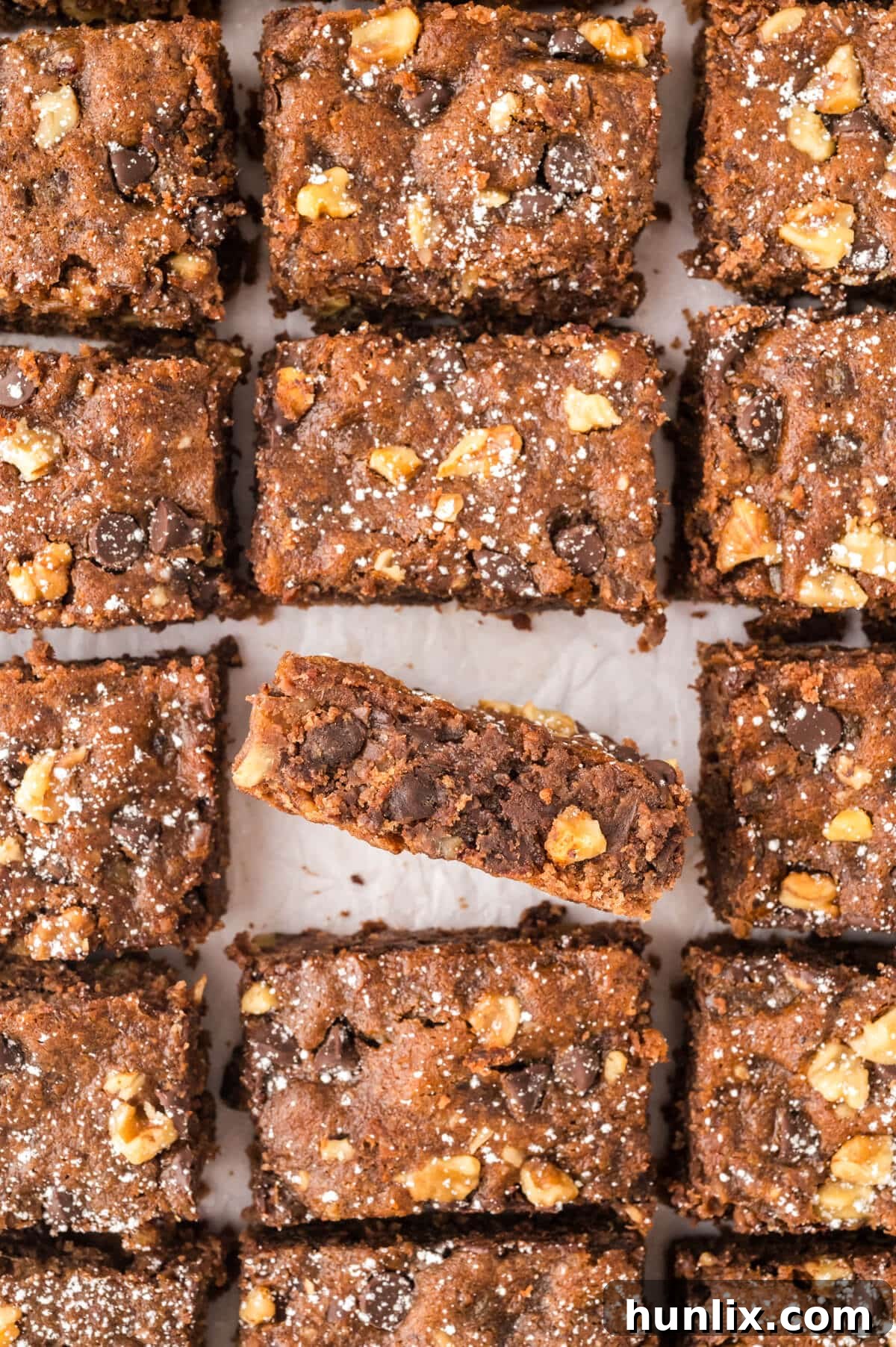 Mystery Chocolate Bars 2 Chocolate surprise bars cut into squares, dusted with powdered sugar.