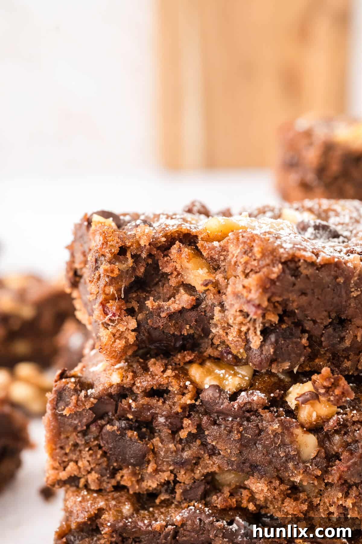 Mystery Chocolate Bars 8 A chocolate surprise bar with a bite taken out, showing the fudgy texture and melted chocolate chips.