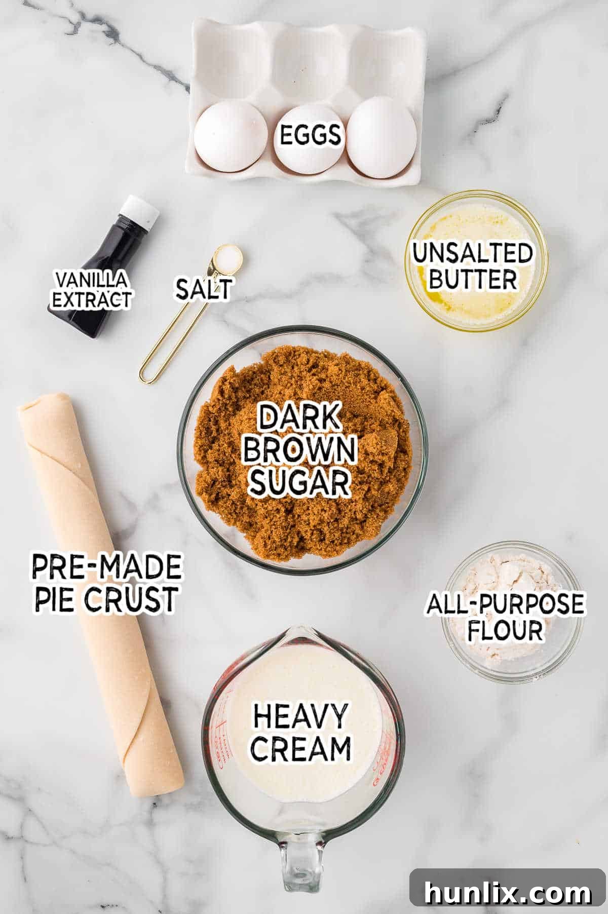 All the ingredients for sugar pie laid out on a kitchen counter.