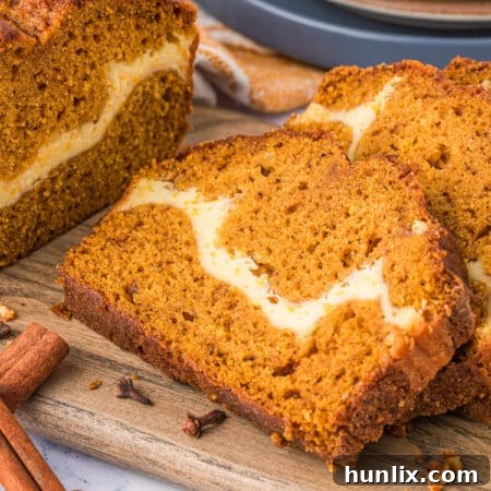 Bread slices on a wooden cutting board.