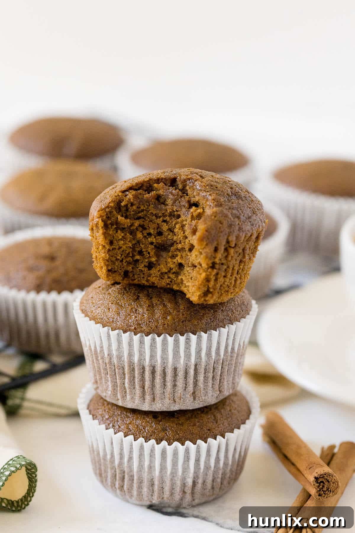 A stack of warm gingerbread muffins, ready to be enjoyed.