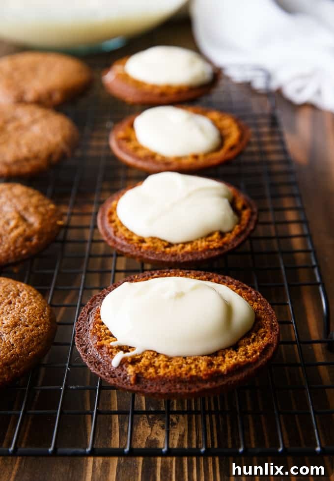 Gingerbread Whoopie Pies - Assembling the whoopie pies with creamy filling.