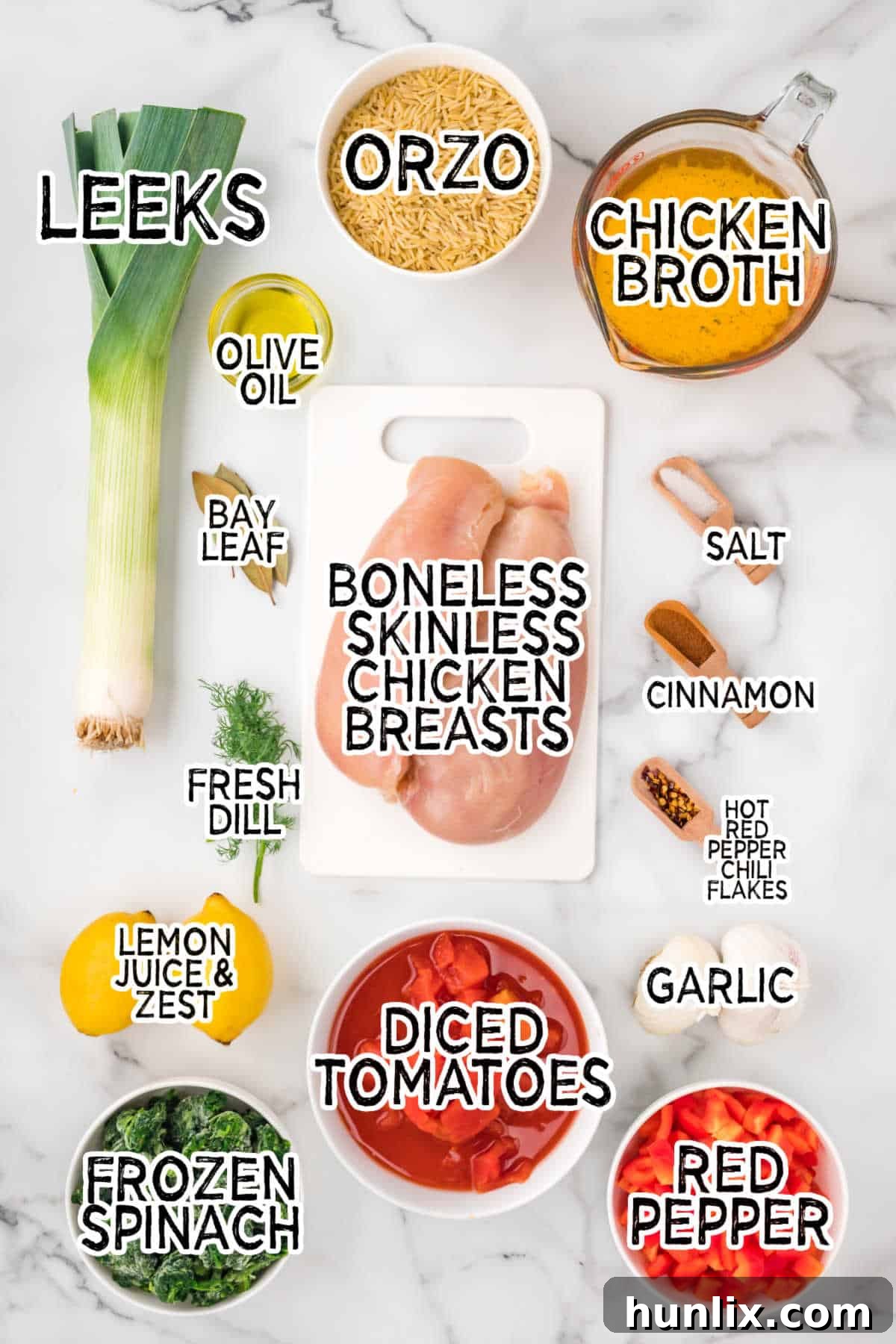 A vibrant selection of fresh ingredients laid out for Greek Chicken Orzo Soup.