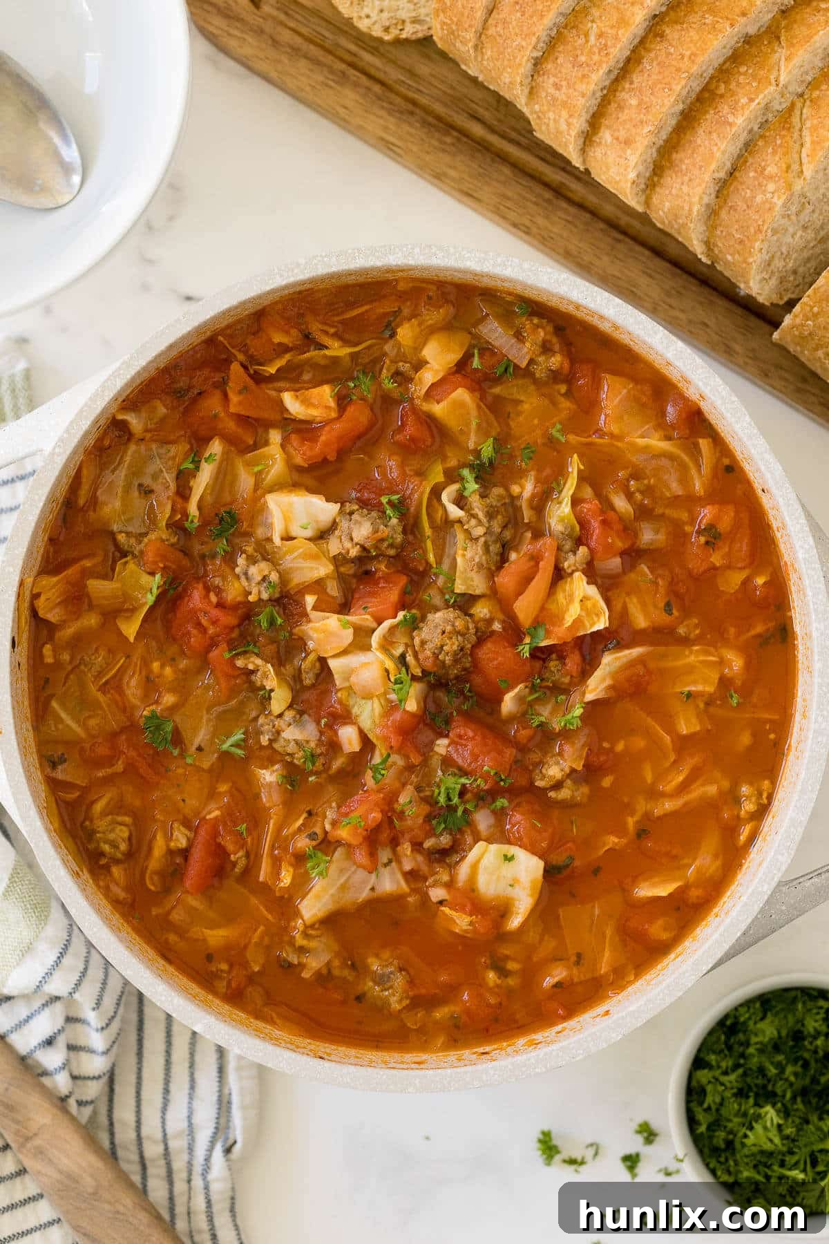 Hearty Sausage and Cabbage Soup 2 A hearty bowl of Sausage and Cabbage Soup, inviting and comforting.