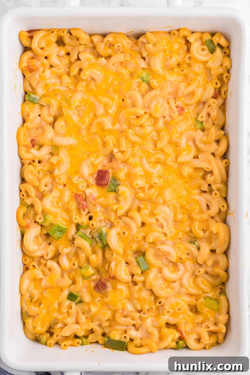 Fiesta Mac & Cheese 2 Salsa Macaroni & Cheese - Classic mac and cheese with a Tex Mex twist! Spice levels can be controlled by using medium or hot salsa, which is a great compliment to the cheesy, creamy sauce.