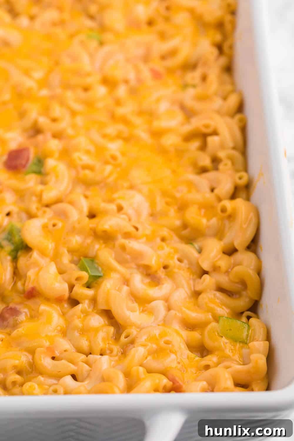 Fiesta Mac & Cheese 3 Salsa Macaroni & Cheese - Classic mac and cheese with a Tex Mex twist! Spice levels can be controlled by using medium or hot salsa, which is a great compliment to the cheesy, creamy sauce.