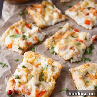 Ocean's Bounty Pizza 17 Seafood Pizza, ready to be served as a festive appetizer or main course.