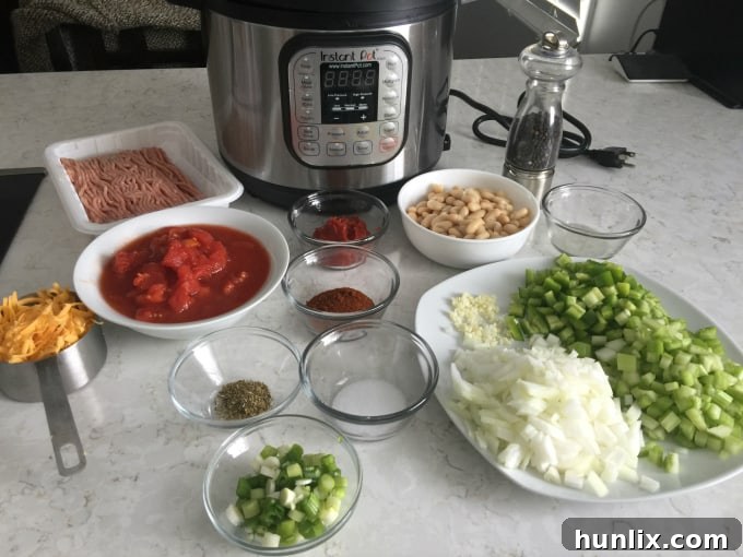 Quick White Bean & Turkey Chili – This Instant Pot chili is easy to make and so delicious! Find more Instant Pot recipes in the How to Instant Pot cookbook from Workman Publishing.