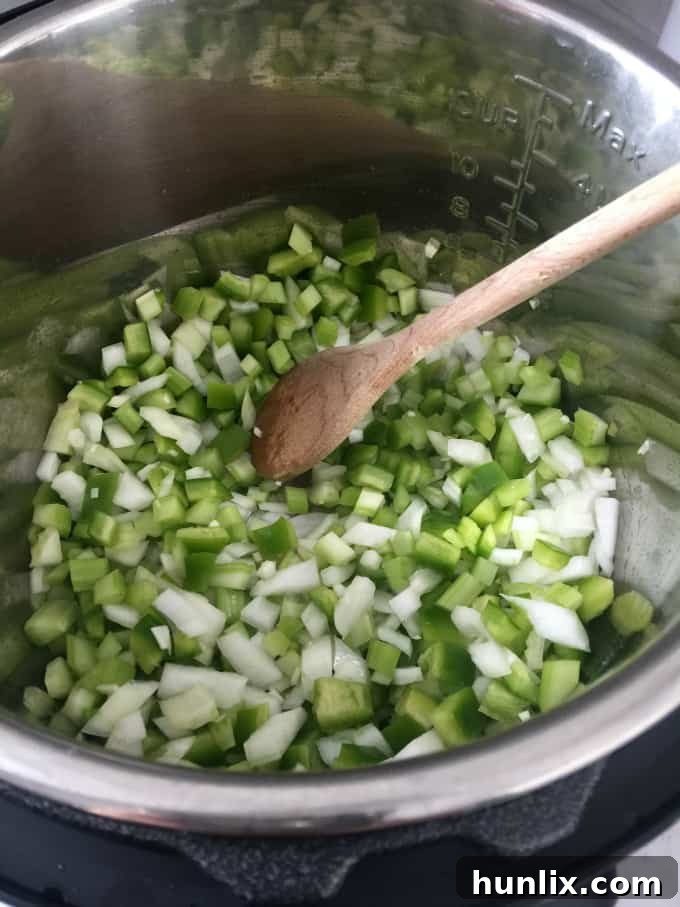 Quick White Bean & Turkey Chili – This Instant Pot chili is easy to make and so delicious! Find more Instant Pot recipes in the How to Instant Pot cookbook from Workman Publishing.