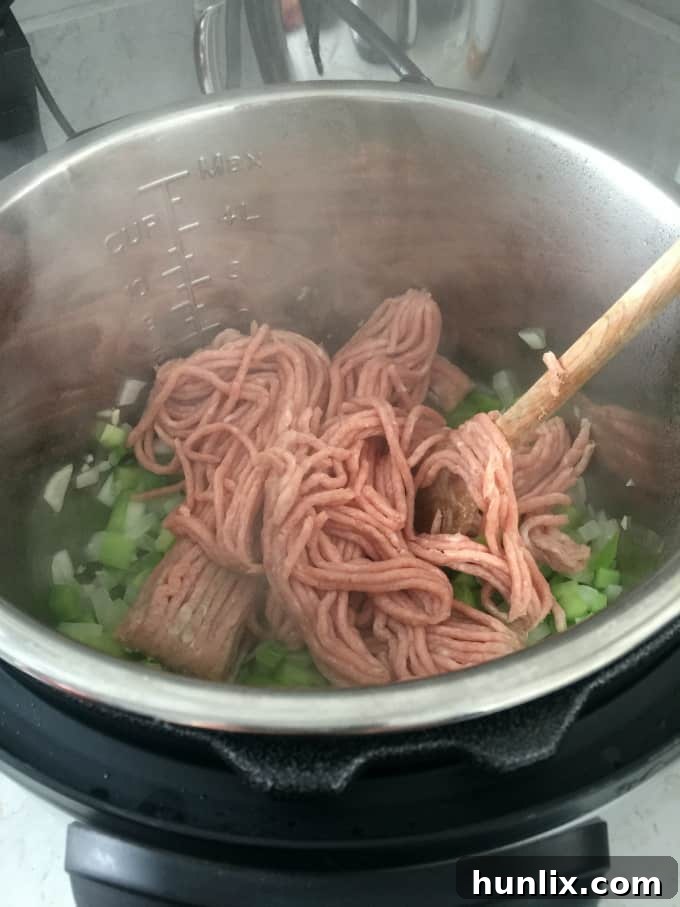 Quick White Bean & Turkey Chili – This Instant Pot chili is easy to make and so delicious! Find more Instant Pot recipes in the How to Instant Pot cookbook from Workman Publishing.