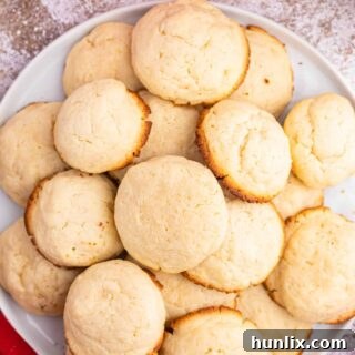 A beautiful plate of soft cream cheese cookies.