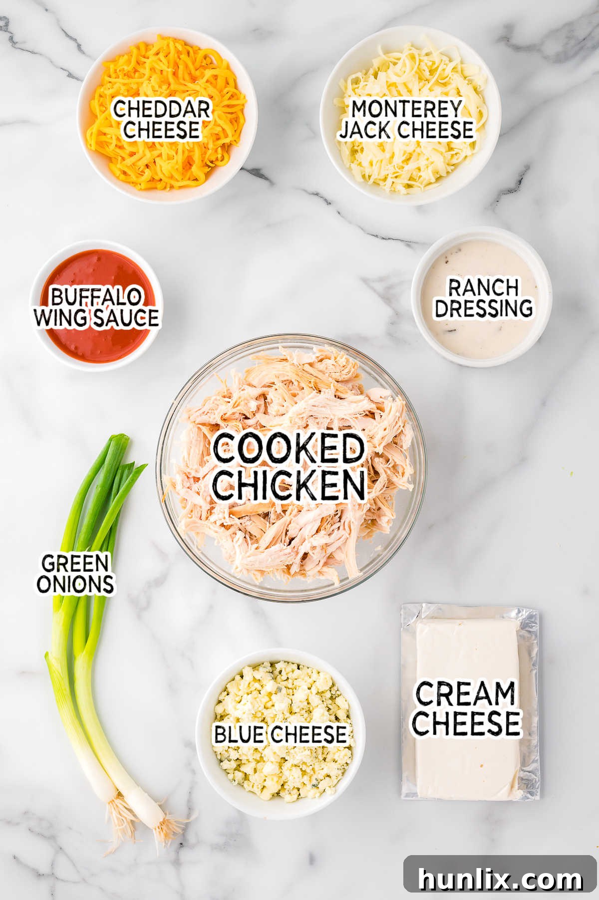 Buffalo chicken dip ingredients.