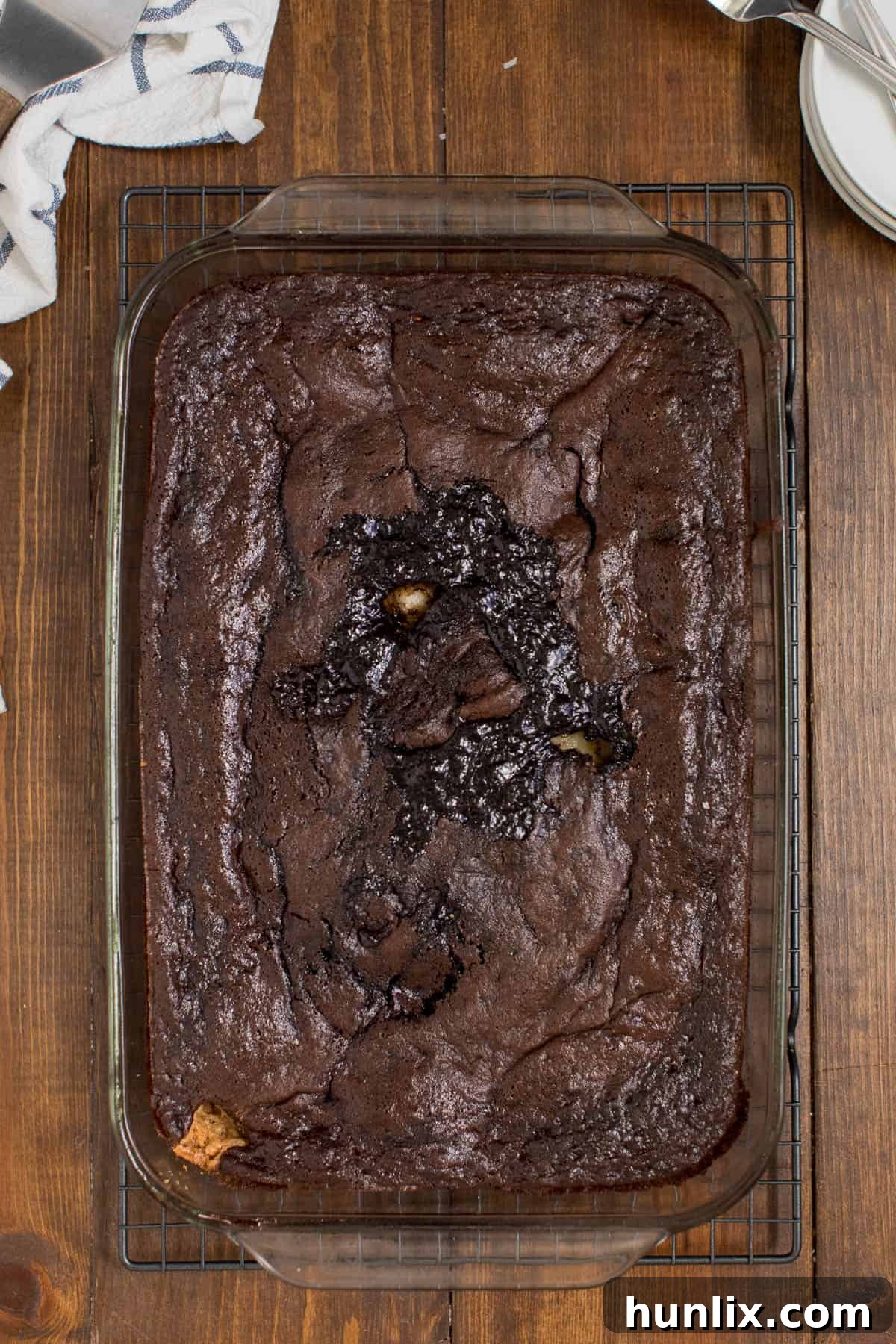 A pan of earthquake cake, showing its cracked, gooey top layer.