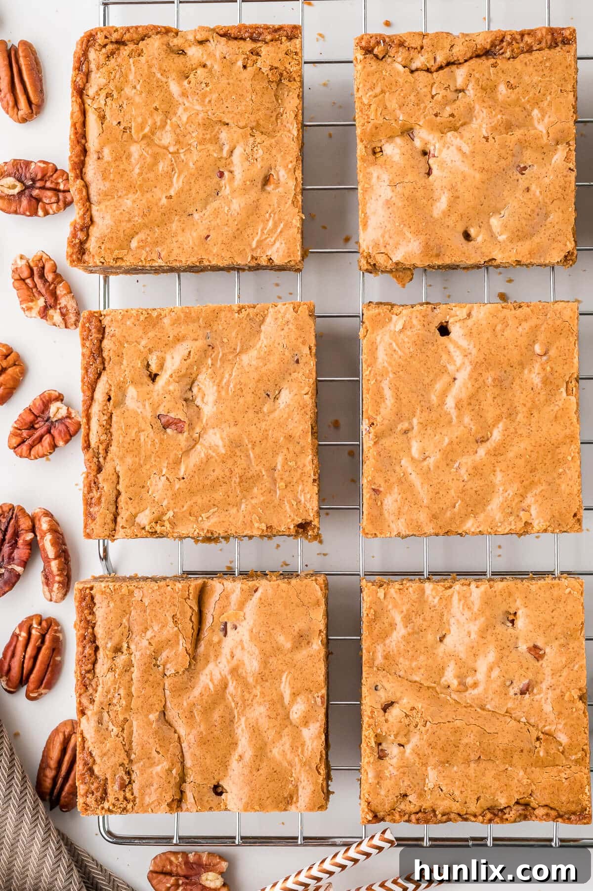 Freshly baked Penuche squares cooling on a wire rack, ready to be enjoyed.