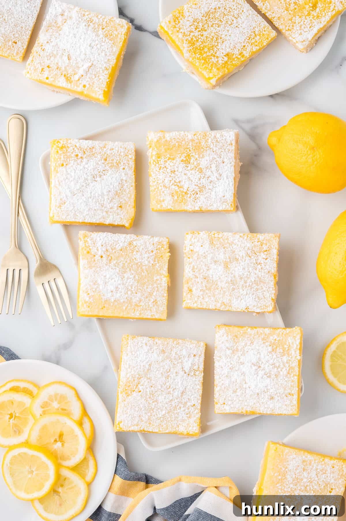 Lemon bars presented beautifully on a platter, ready for serving.