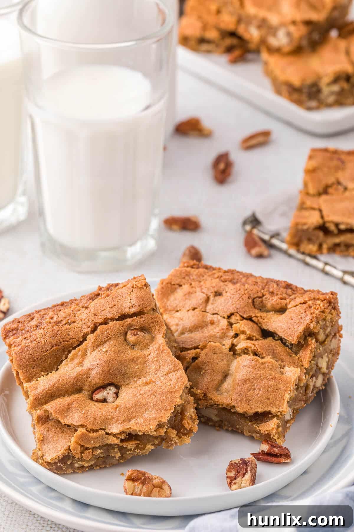 A single piece of butterscotch blondie on a plate, ready to be enjoyed.