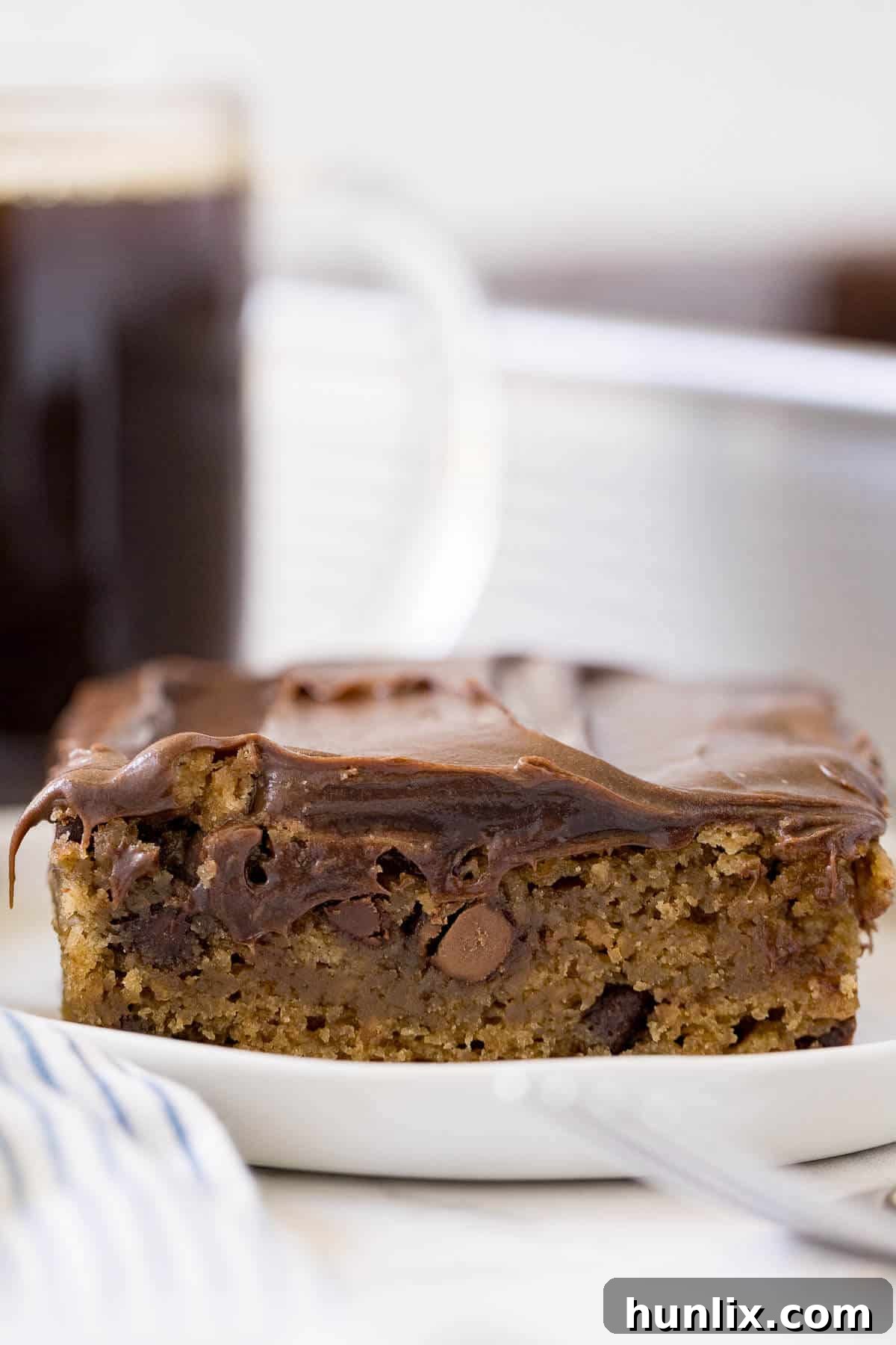 A slice of cake on a plate.