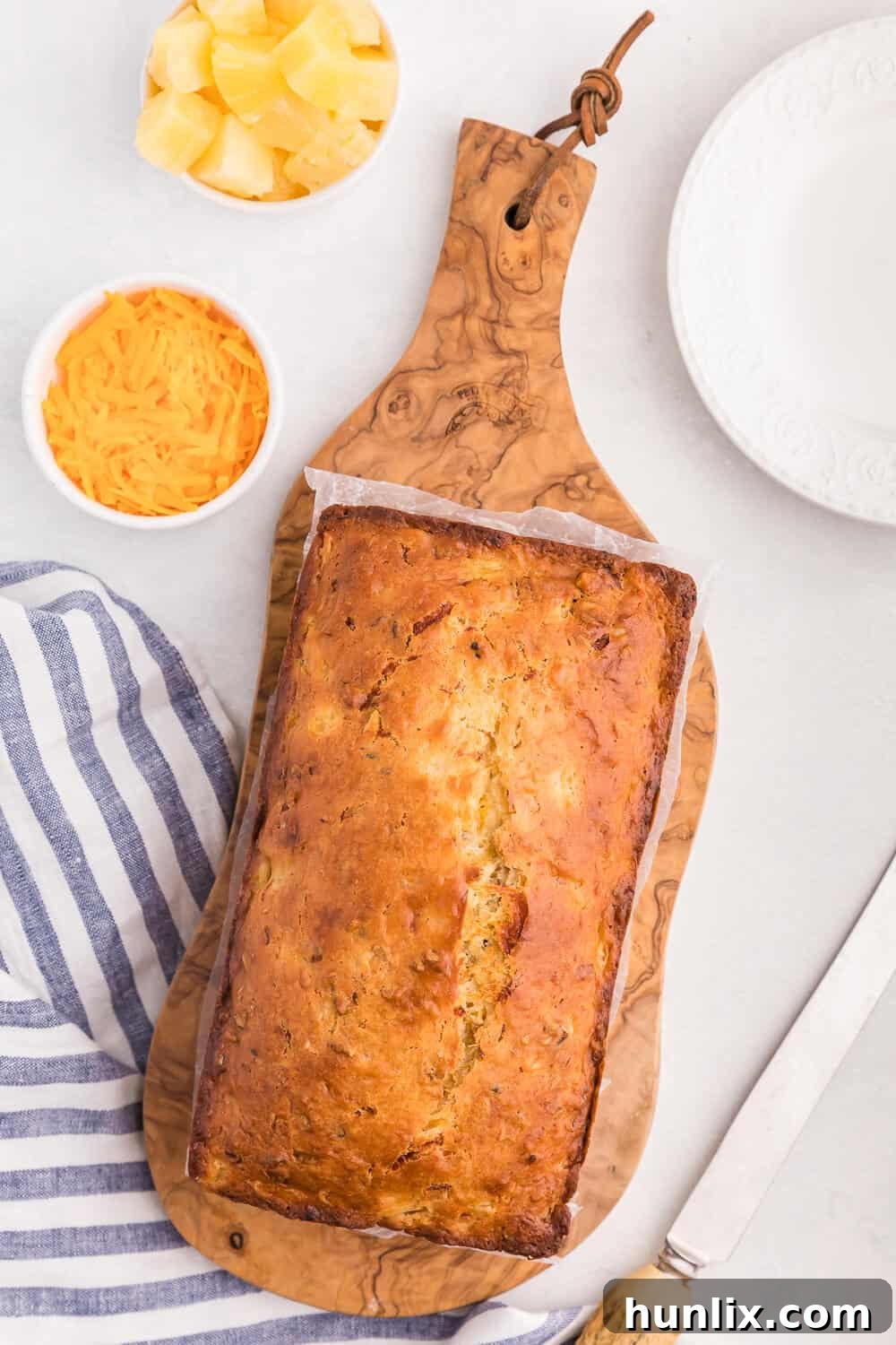 Freshly baked Pineapple Cheese Bread loaf, warm and golden